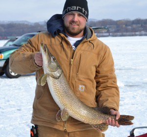 Jared Albitz of Onalaska caught this 37-inch northern in the Atomic Ice Derby. (Photo by Kip Kovar)